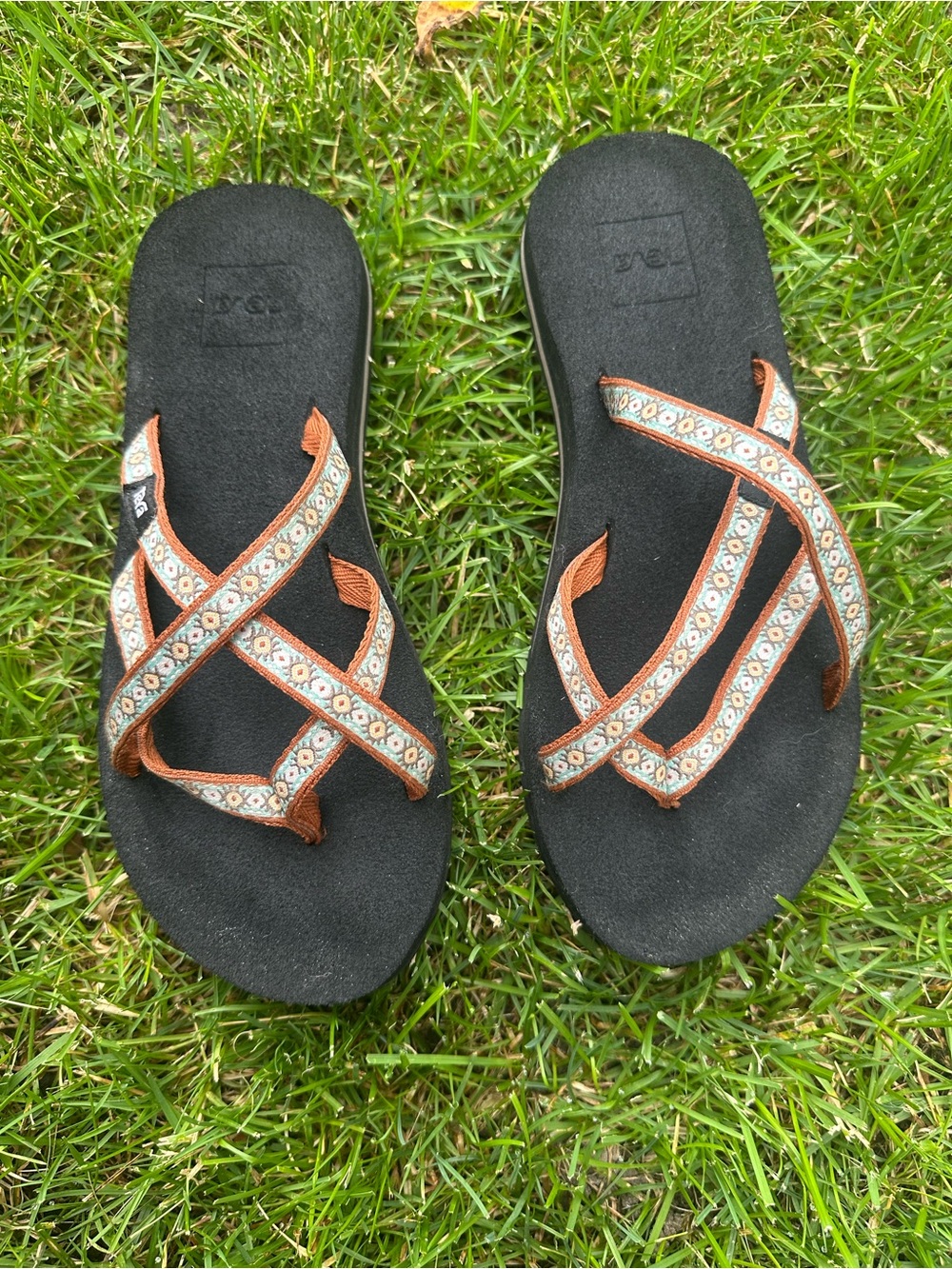 Teva Women's Black Sandals with Brown Patterned Crisscross Straps
